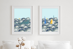 Framed pictures with whale and boats